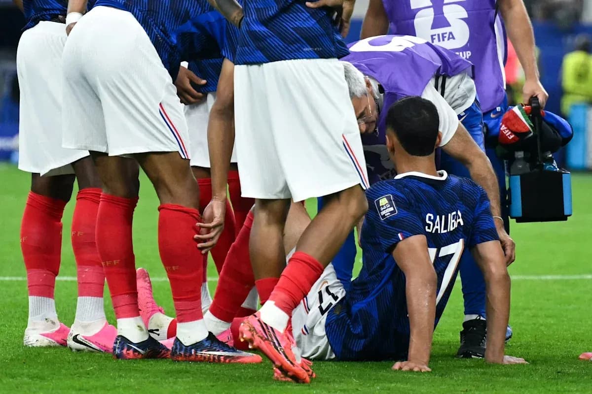 Player receiving medical attention on the field Player receiving medical attention on the field
