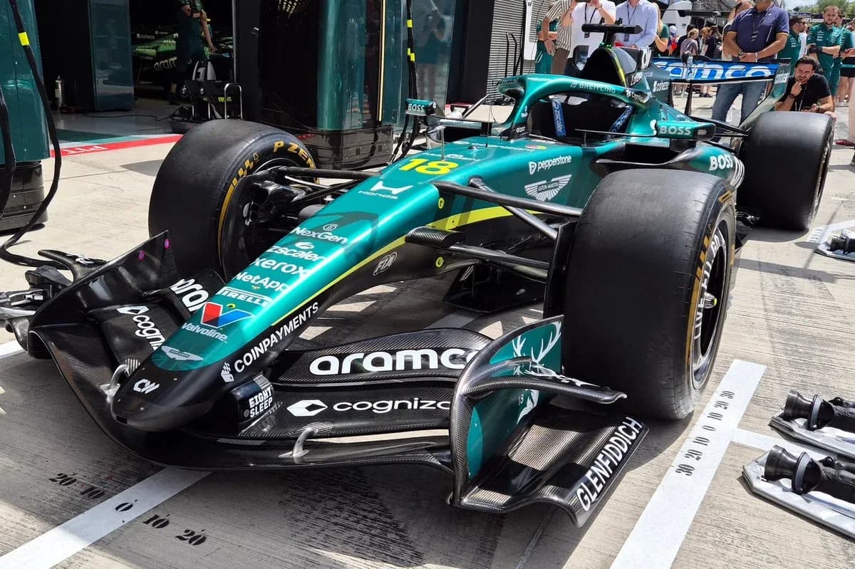 Aston Martin Formula 1 car in the pit area Aston Martin Formula 1 car in the pit area