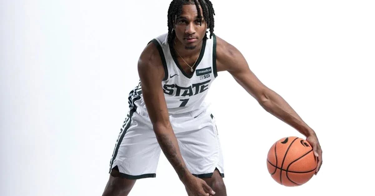 Basketball player dribbling with ball in uniform Basketball player dribbling with ball in uniform