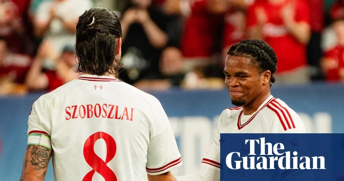 Football players celebrating during a match Football players celebrating during a match