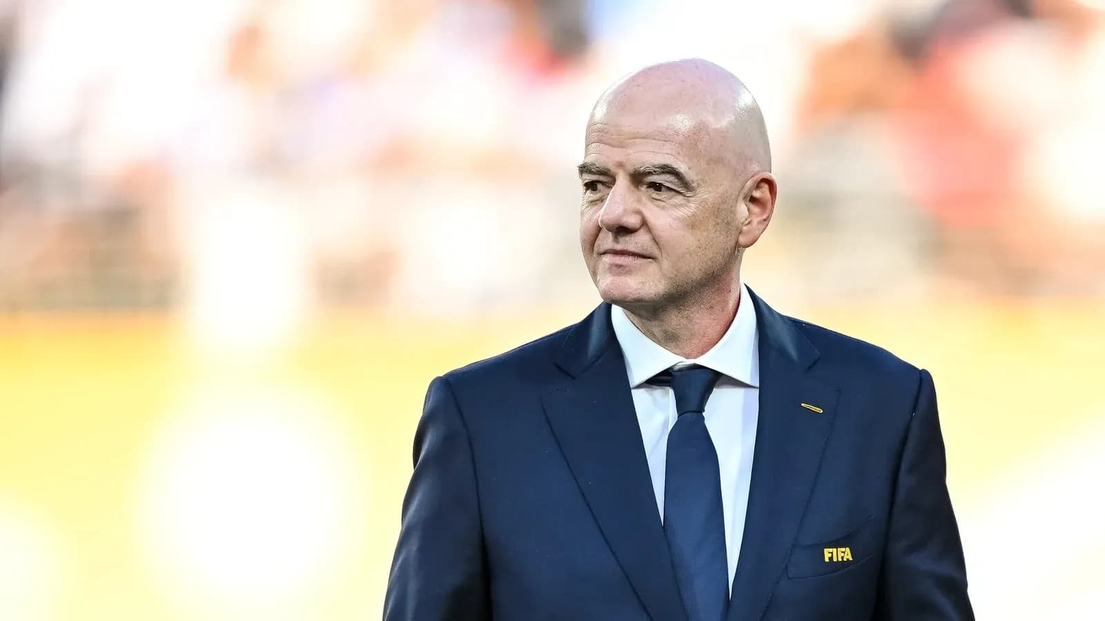 FIFA official in suit at event FIFA official in suit at event