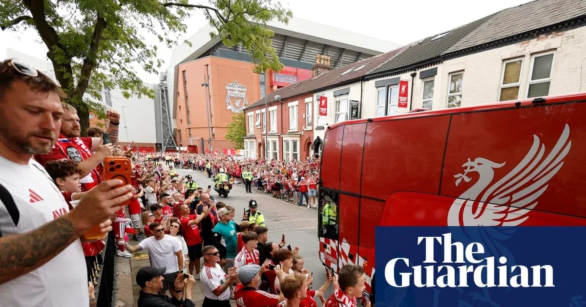 Liverpool fans greeting team bus outside Anfield Liverpool fans greeting team bus outside Anfield