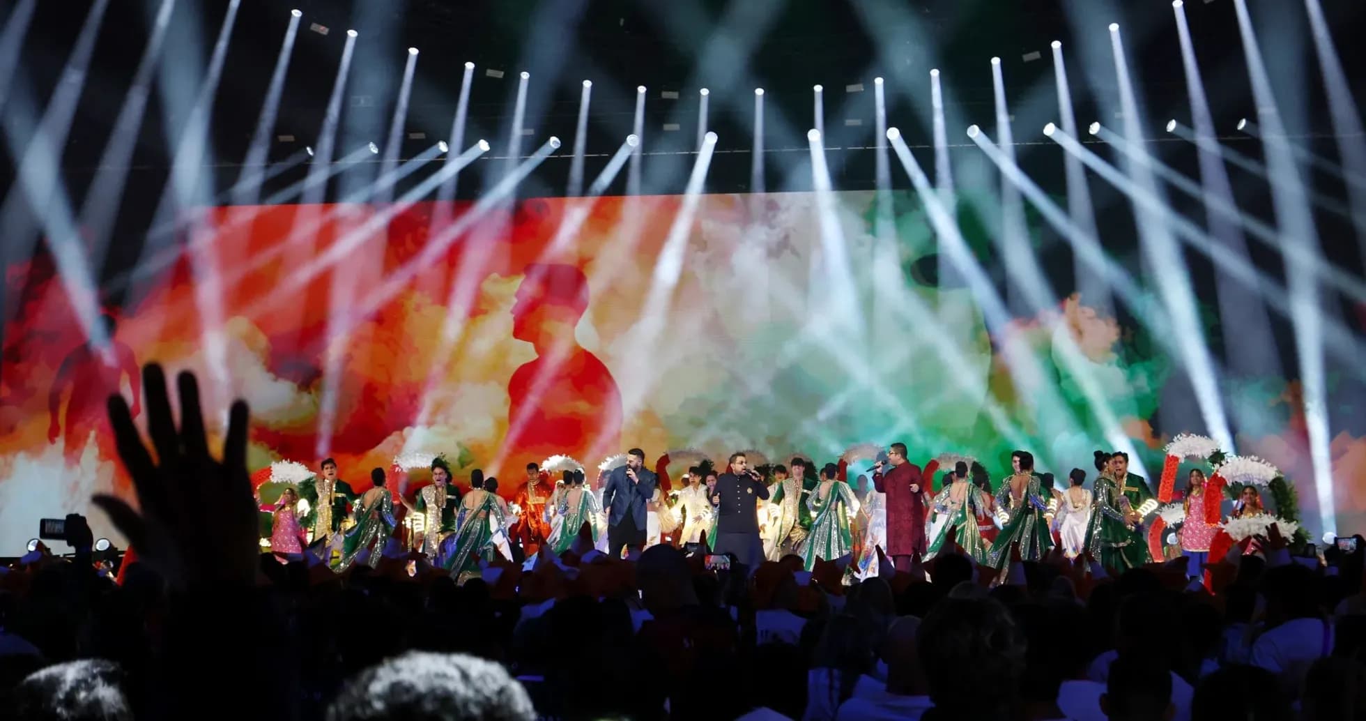 Cultural performance on stage with colorful lights Cultural performance on stage with colorful lights