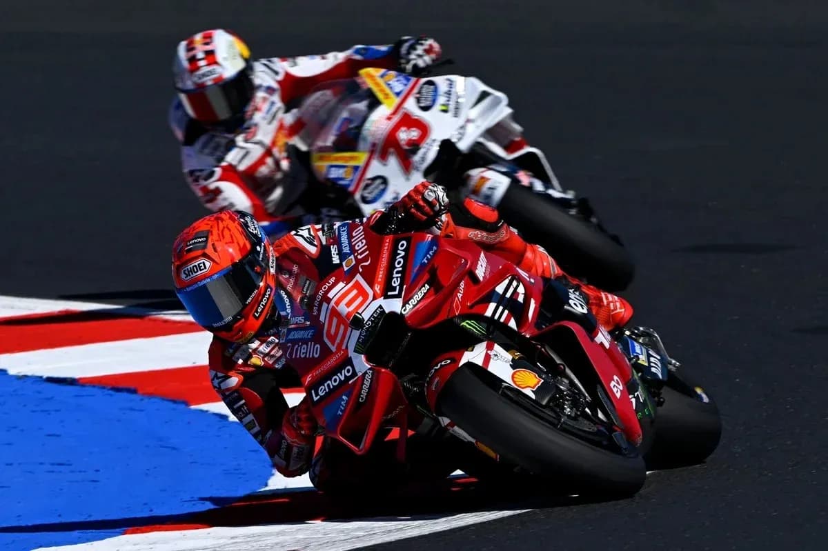 Riders competing on motorcycles during a race Riders competing on motorcycles during a race