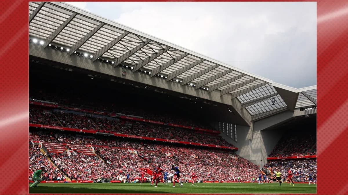 Football match at Anfield with large crowd Football match at Anfield with large crowd