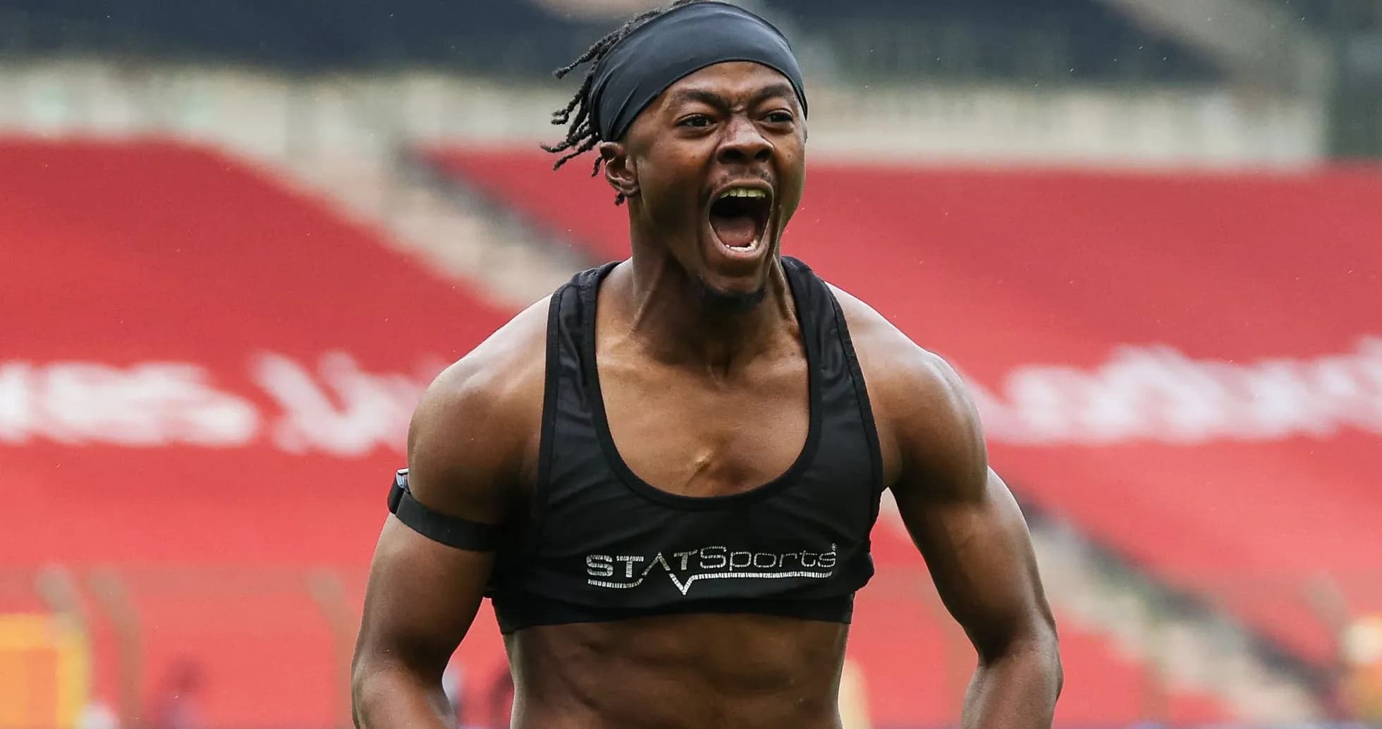 Athlete celebrating on the training field Athlete celebrating on the training field