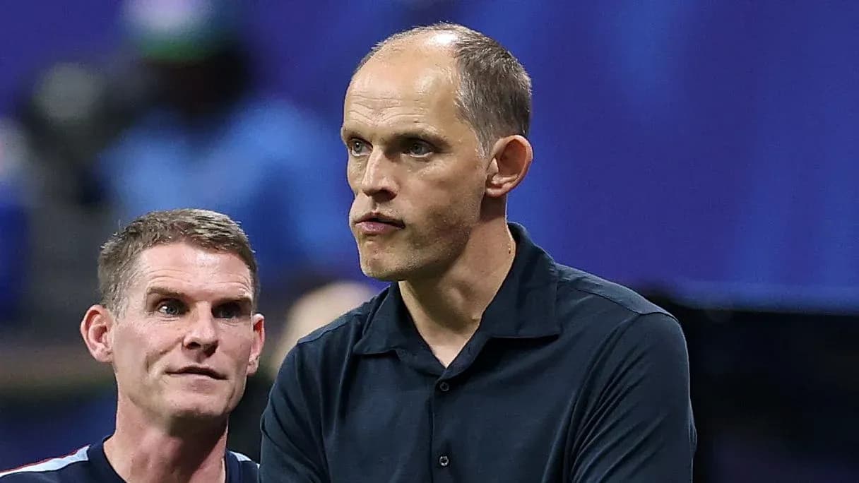 Two coaches discussing during a match Two coaches discussing during a match