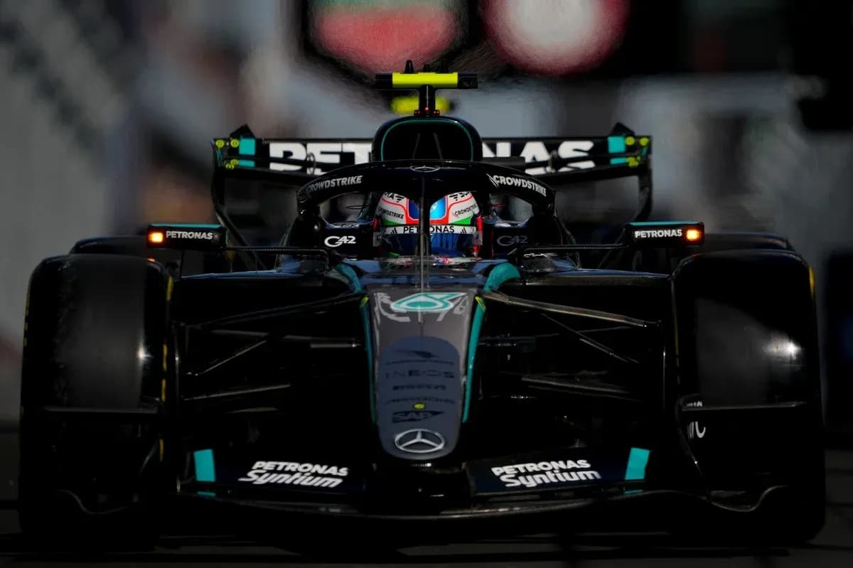 Formula 1 car racing on track during event Formula 1 car racing on track during event
