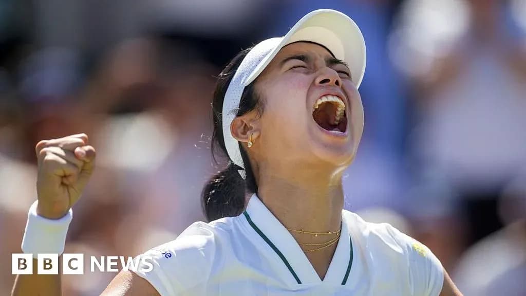 Tennis player celebrating victory with raised fist Tennis player celebrating victory with raised fist