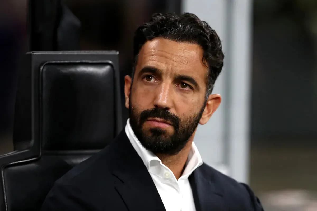 Coach sitting on bench during match Coach sitting on bench during match