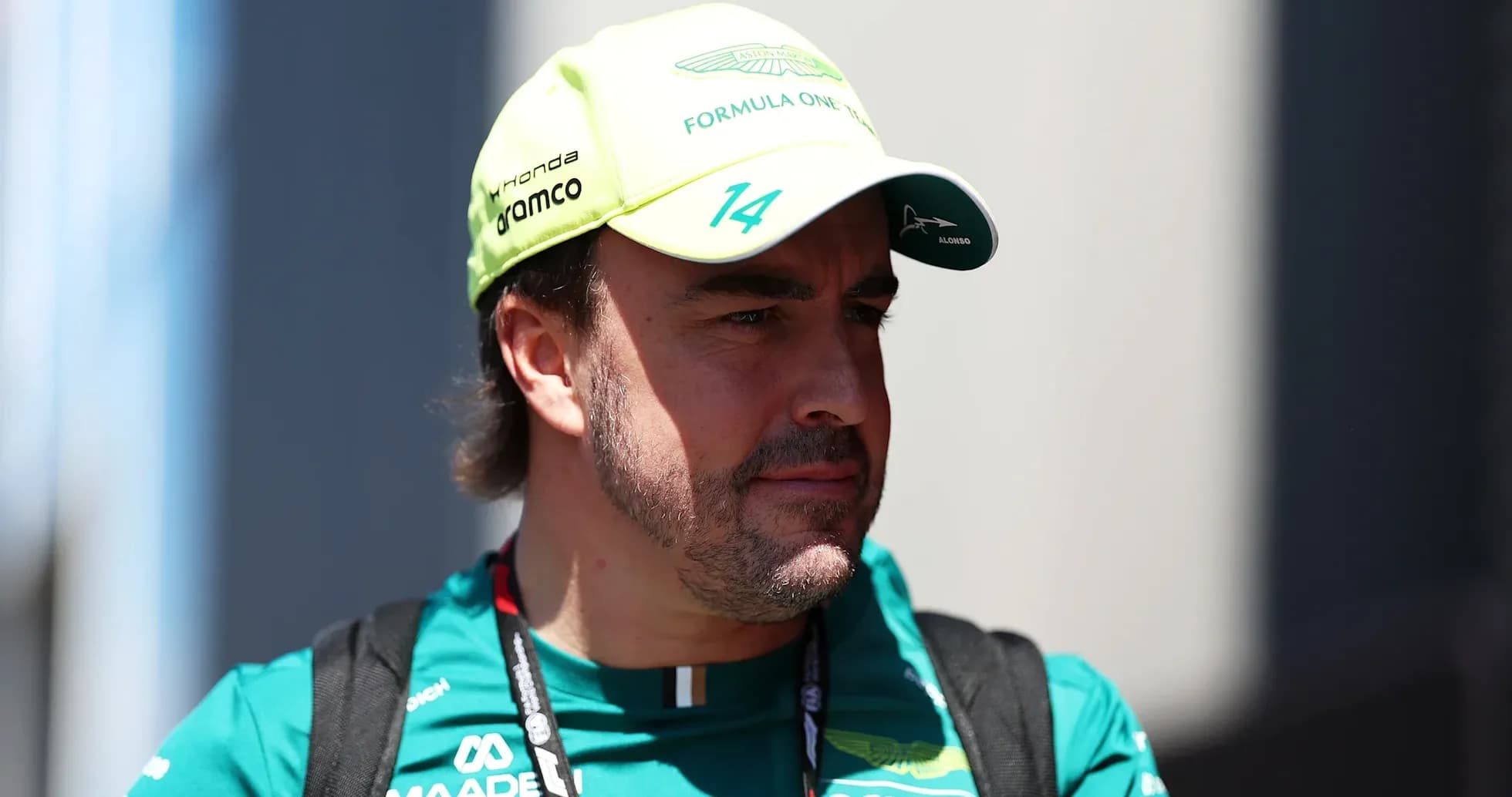 Formula 1 driver in Aston Martin team cap Formula 1 driver in Aston Martin team cap