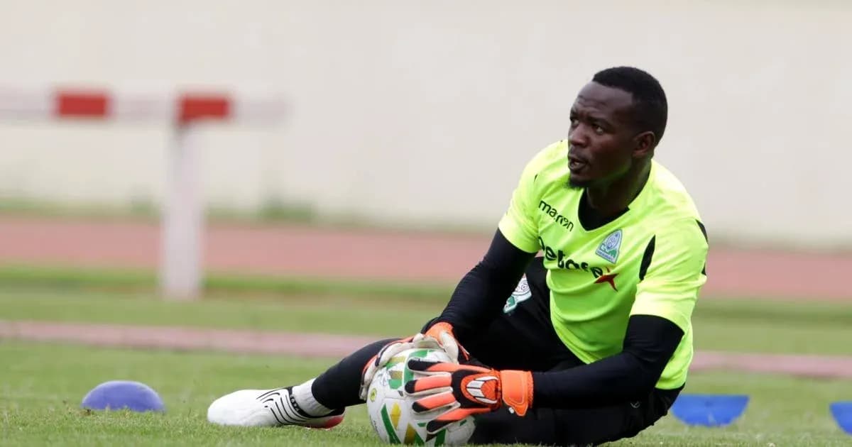 Goalkeeper training on the field with ball Goalkeeper training on the field with ball