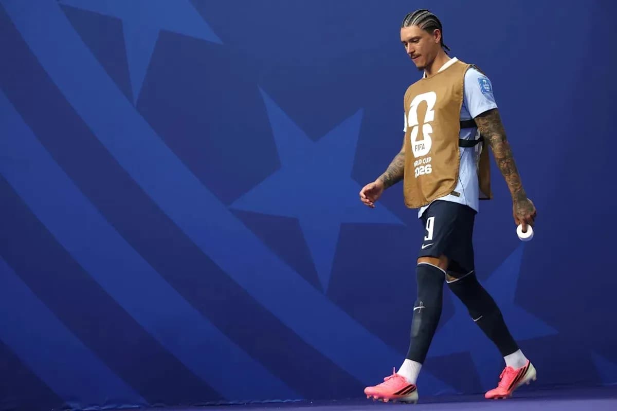 Futbolchi maydoniga chiqayotgan jamoa a'zosi Futbolchi maydoniga chiqayotgan jamoa a'zosi