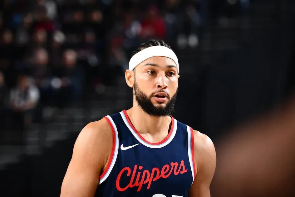 Basketball player in Clippers uniform during game Basketball player in Clippers uniform during game