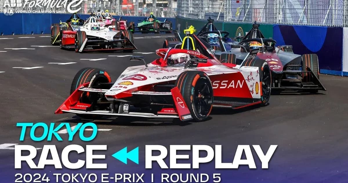 Formula E cars racing during Tokyo E-Prix event Formula E cars racing during Tokyo E-Prix event