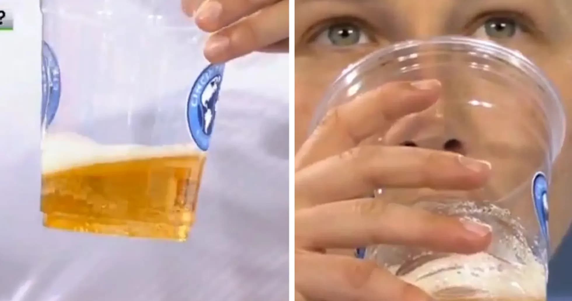 Person holding cup of beer, preparing to drink Person holding cup of beer, preparing to drink