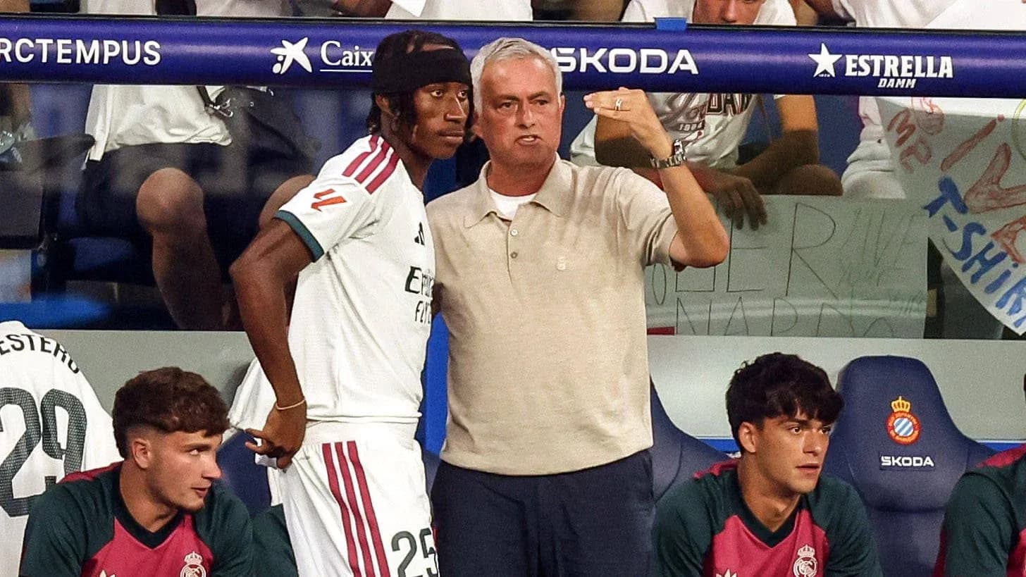Jozef Mourinho instructing player on the bench Jozef Mourinho instructing player on the bench