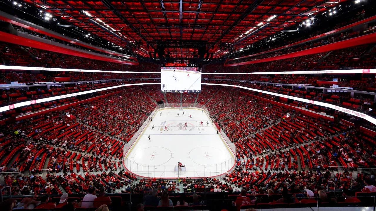 Little Caesars Arena filled with fans during hockey game Little Caesars Arena filled with fans during hockey game