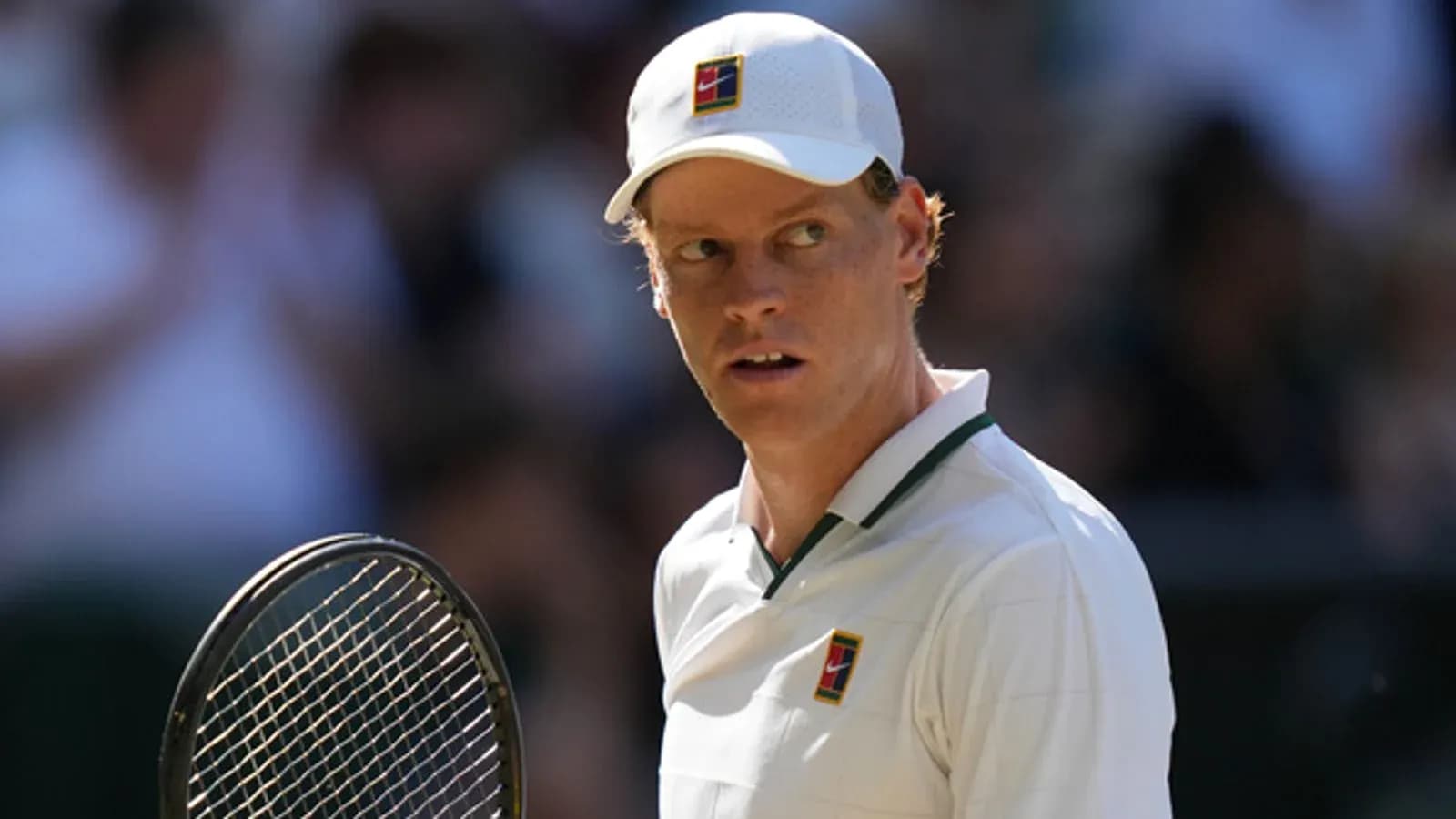Tennis player holding racket during match Tennis player holding racket during match