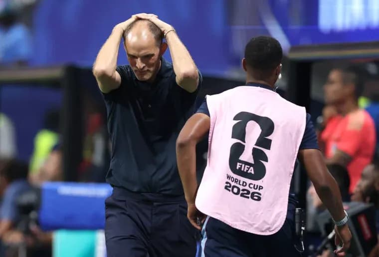 Coach reacting during a tense moment on the sideline Coach reacting during a tense moment on the sideline