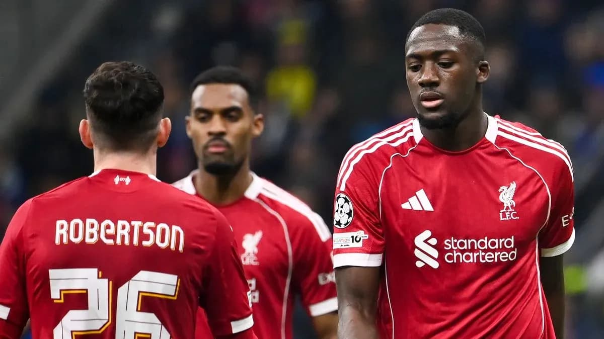 Liverpool players in red jerseys during match Liverpool players in red jerseys during match