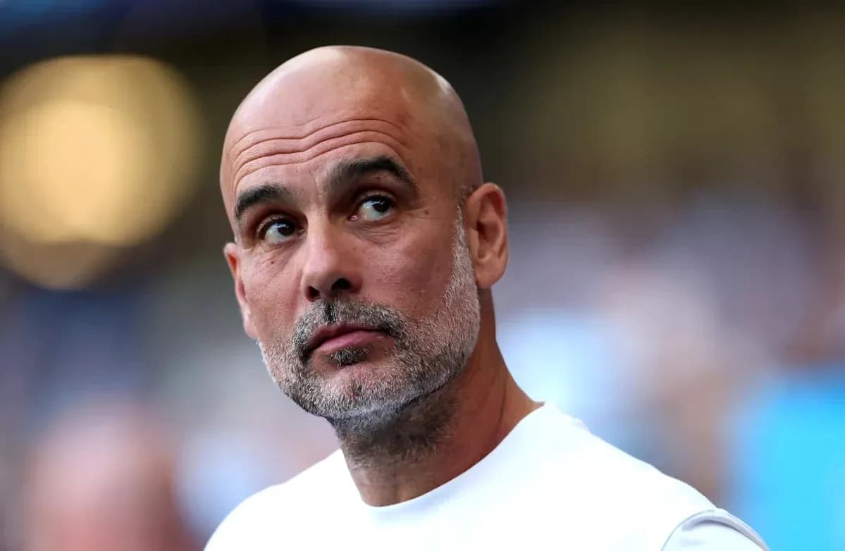 Football manager observing match from sidelines Football manager observing match from sidelines