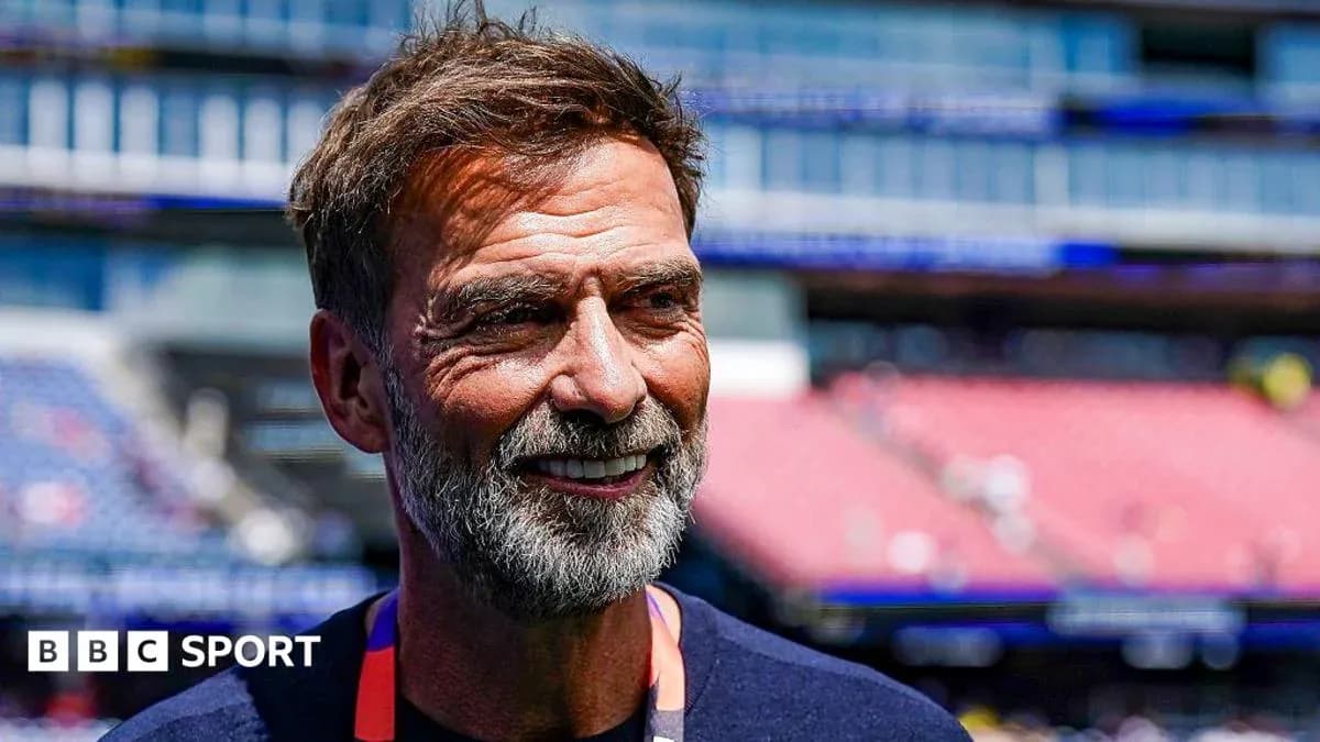 Men coach smiling at stadium before match Men coach smiling at stadium before match