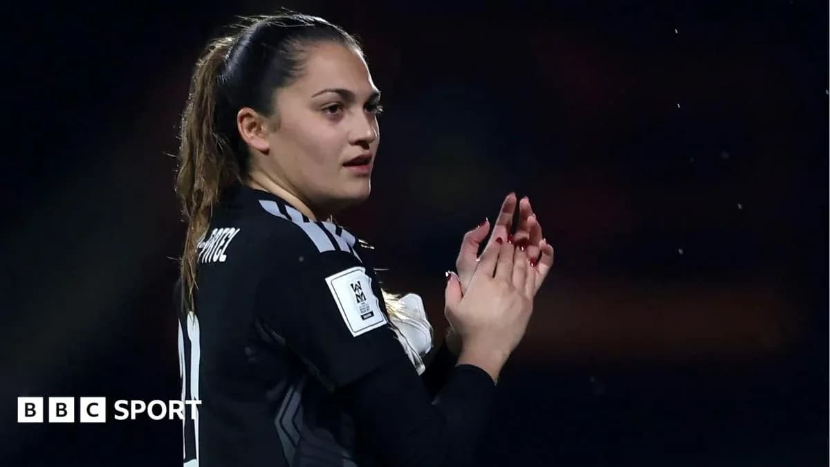 Goalkeeper applauding after match in black kit Goalkeeper applauding after match in black kit