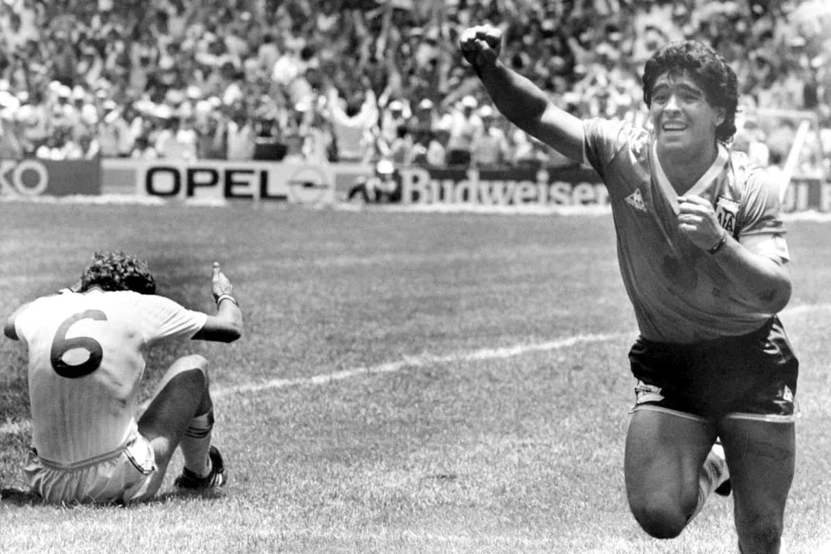 Diego Maradona celebrating after scoring a goal Diego Maradona celebrating after scoring a goal