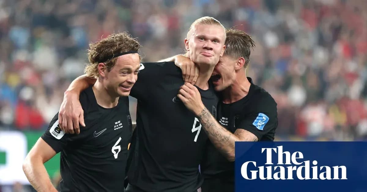 Three players celebrating a goal on the field Three players celebrating a goal on the field