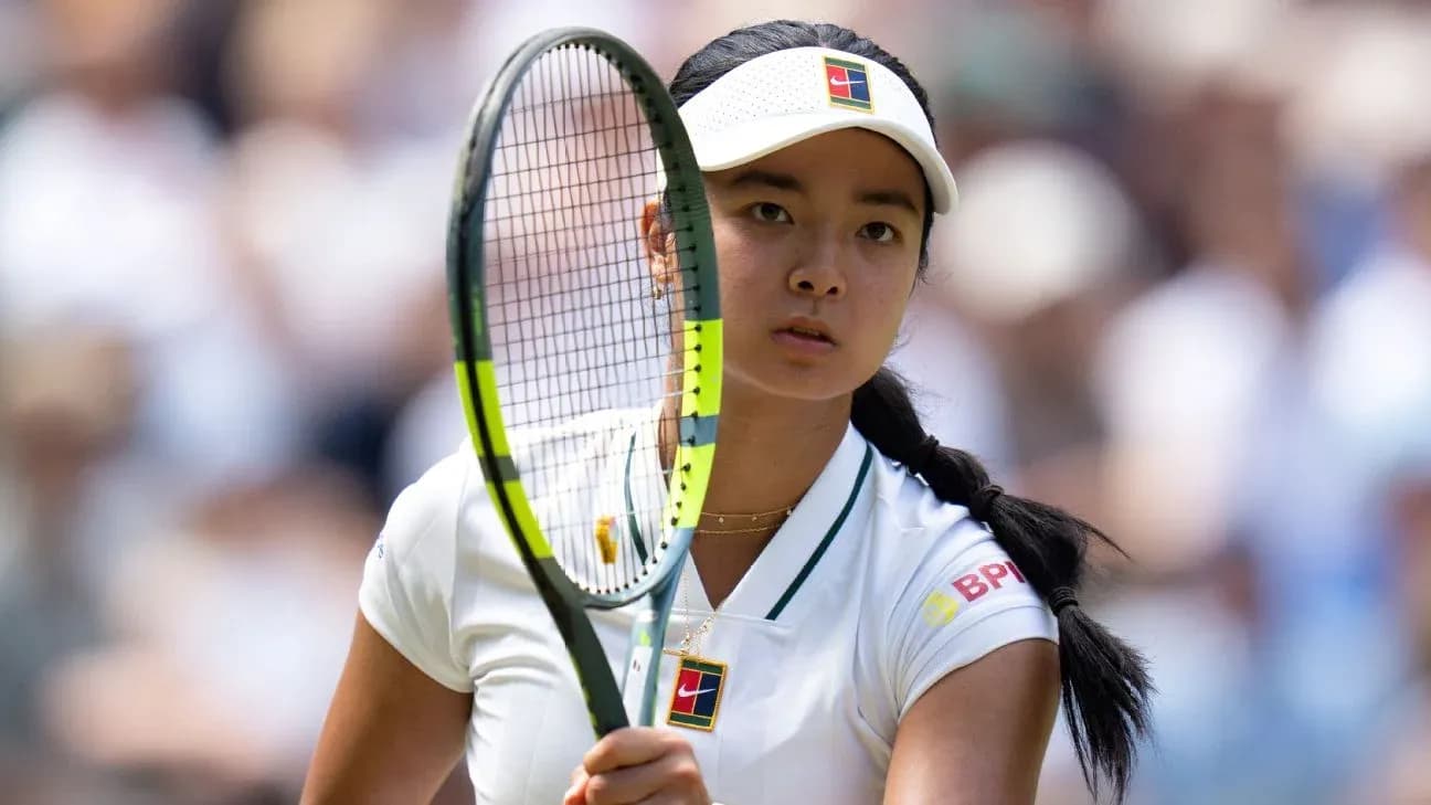 Tennis player preparing to serve during match Tennis player preparing to serve during match