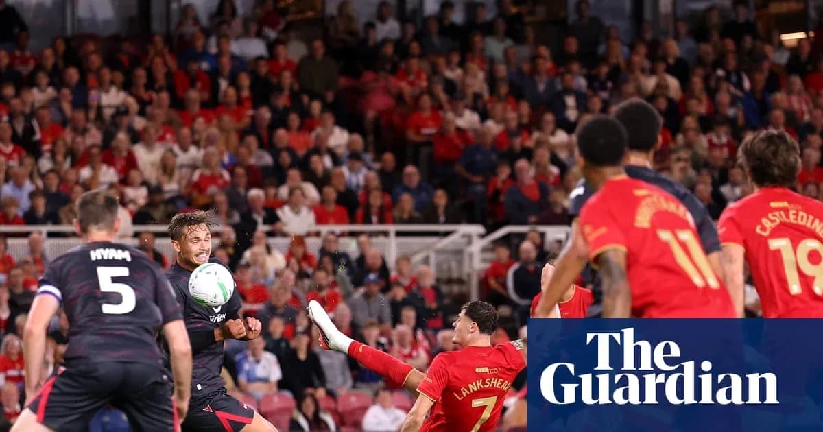 Players competing for the ball during a match Players competing for the ball during a match