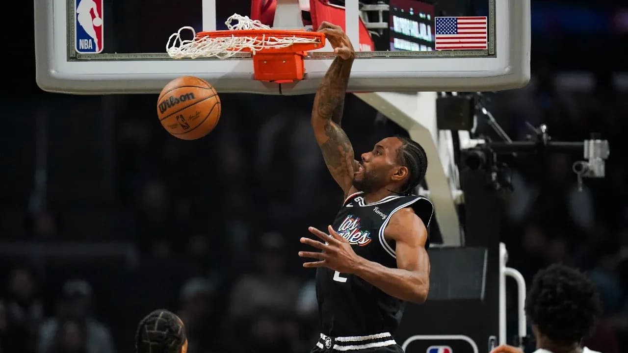 Kawhi Leonard dunking during NBA game action Kawhi Leonard dunking during NBA game action