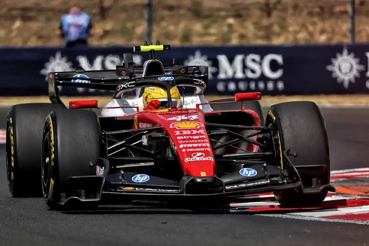 Ferrari Formula 1 car racing on track Ferrari Formula 1 car racing on track