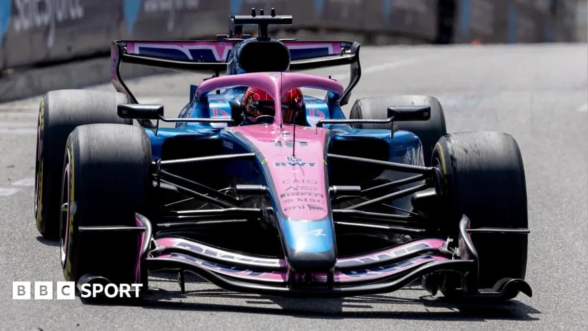 Formula 1 car racing on track during competition Formula 1 car racing on track during competition