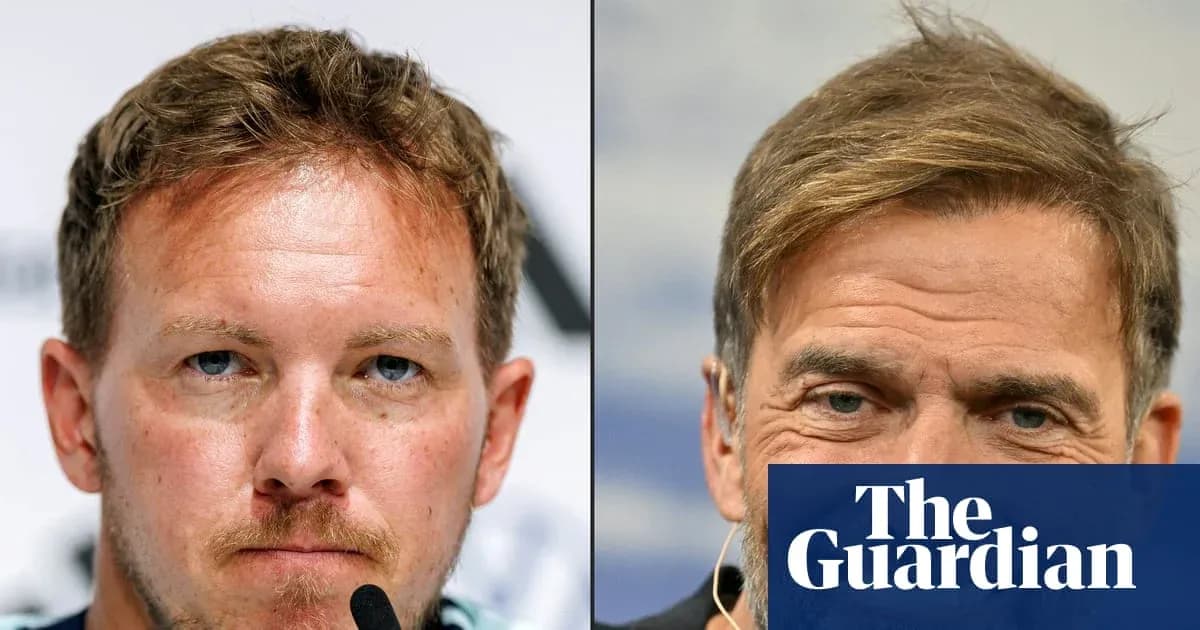 Two coaches at press conference, serious expressions Two coaches at press conference, serious expressions