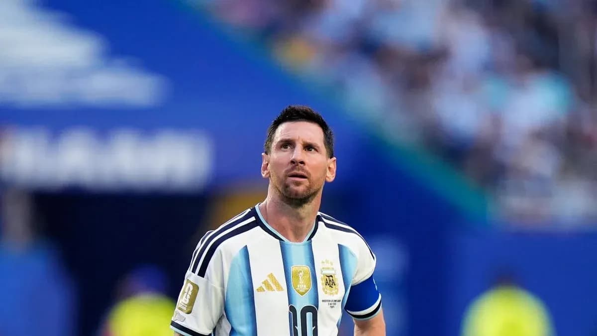 Messi looking up during a match in Argentina jersey Messi looking up during a match in Argentina jersey