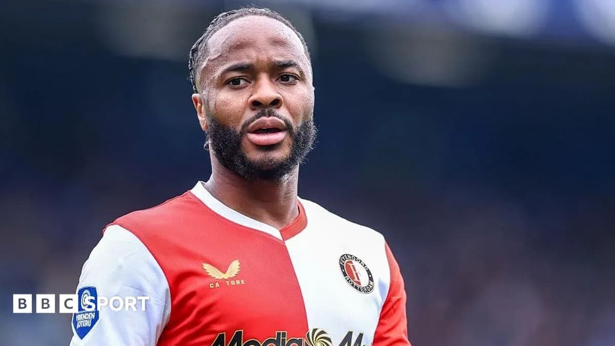 Feyenoord player in red and white jersey on field Feyenoord player in red and white jersey on field