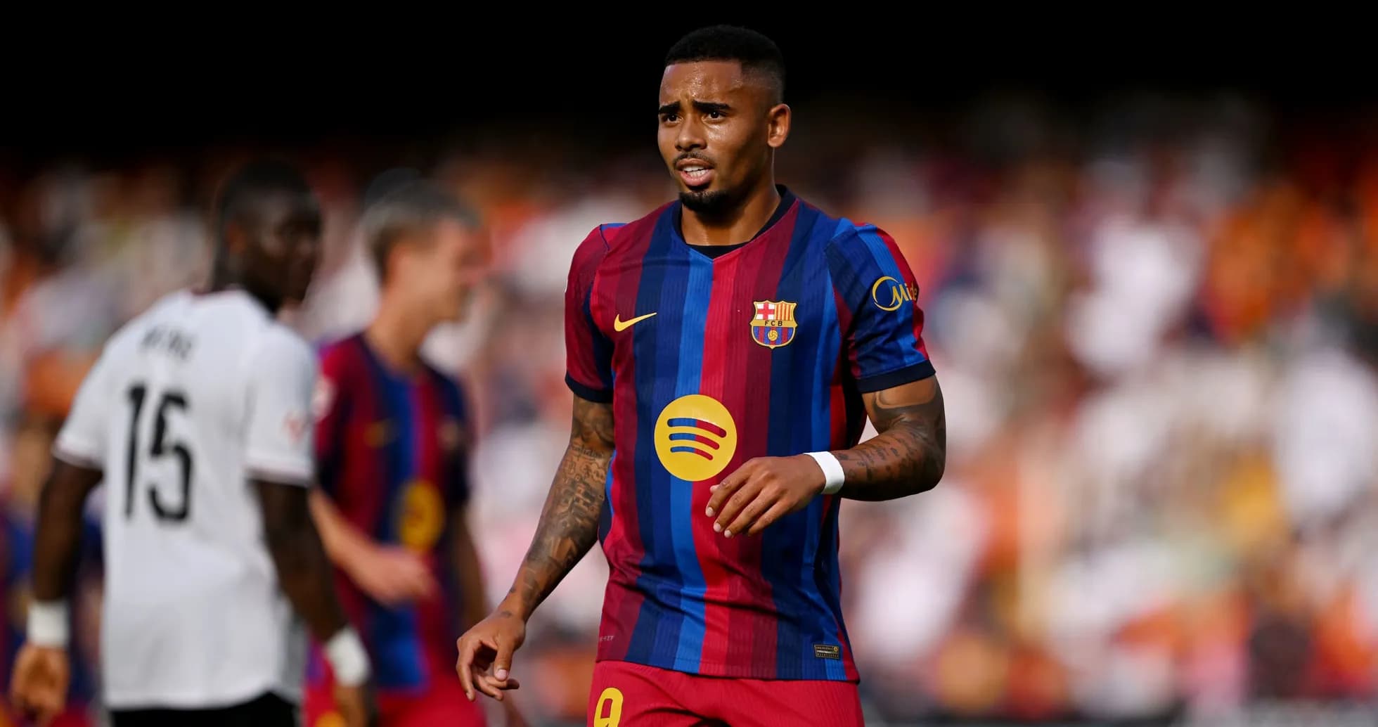 Barcelona player in action during match against Valencia Barcelona player in action during match against Valencia