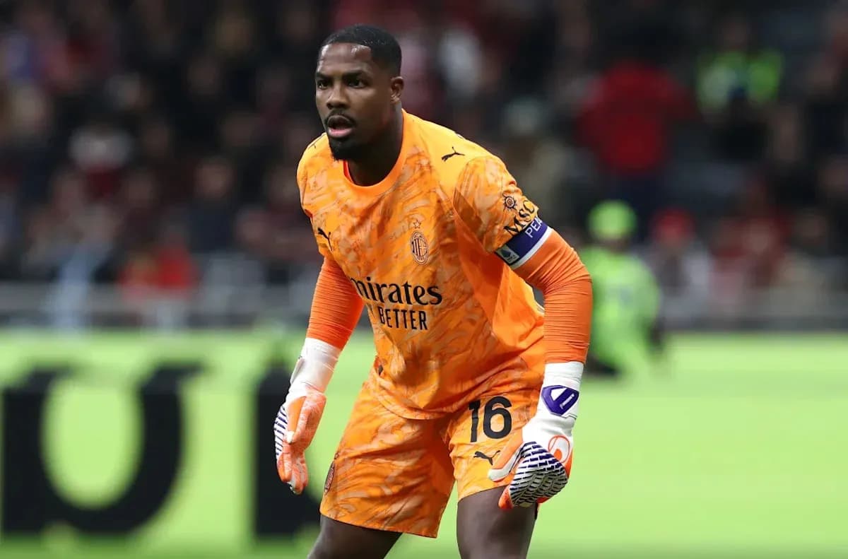 Goalkeeper in orange kit ready for action Goalkeeper in orange kit ready for action