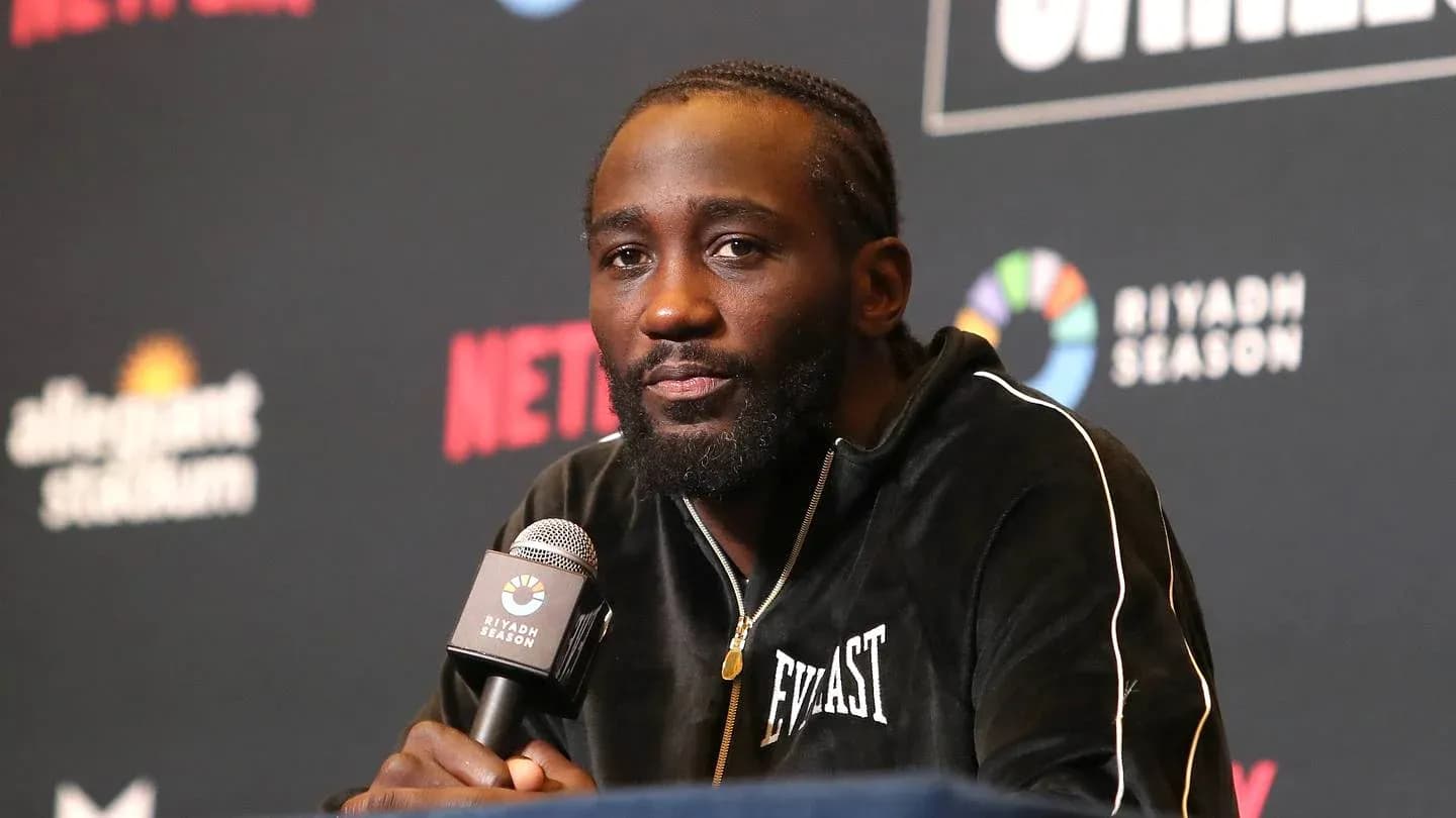 Boxer speaking at a press conference with microphone Boxer speaking at a press conference with microphone