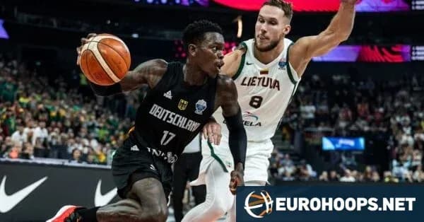 Basketball players competing during a match Basketball players competing during a match
