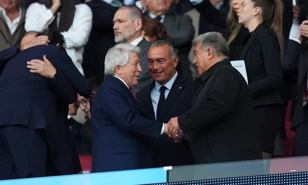 Officials shaking hands in stadium stands Officials shaking hands in stadium stands