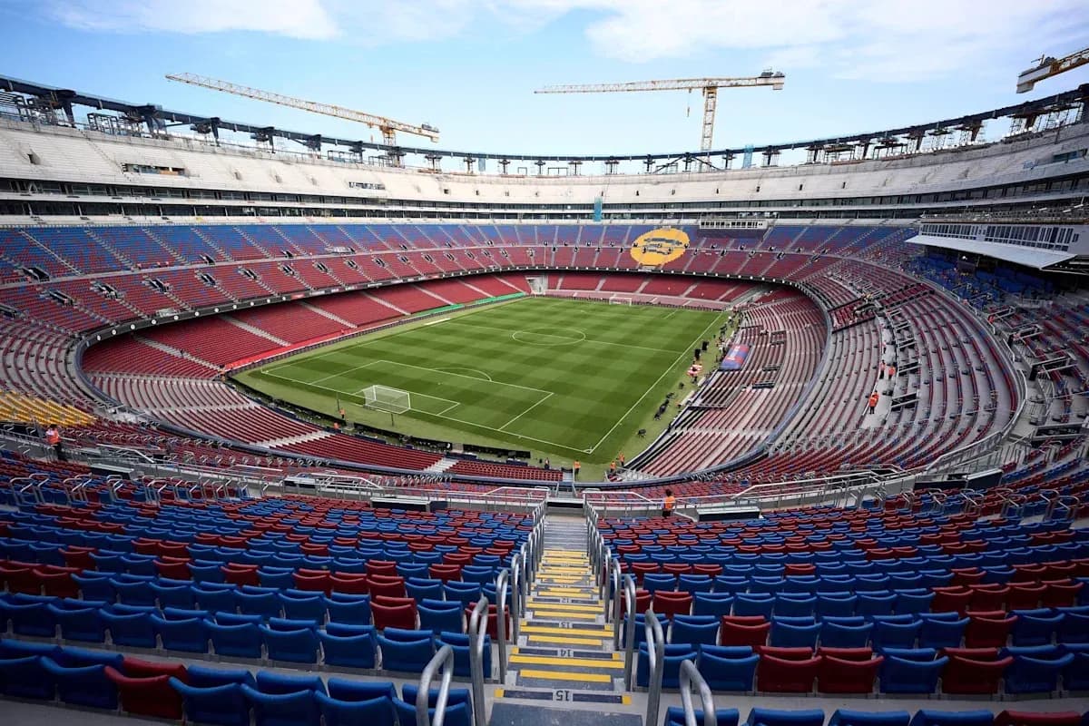 Camp Nou stadium with empty seats and field Camp Nou stadium with empty seats and field