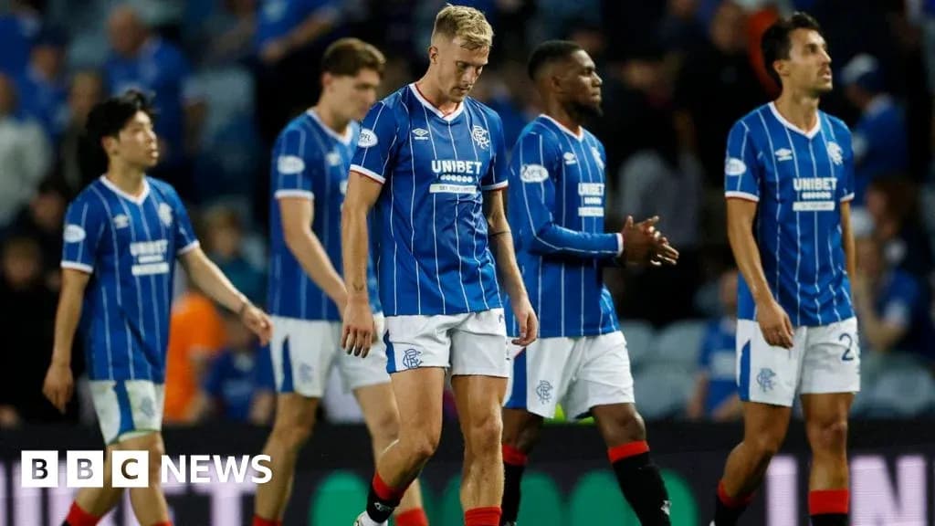 Rangers players walking off the pitch after match Rangers players walking off the pitch after match