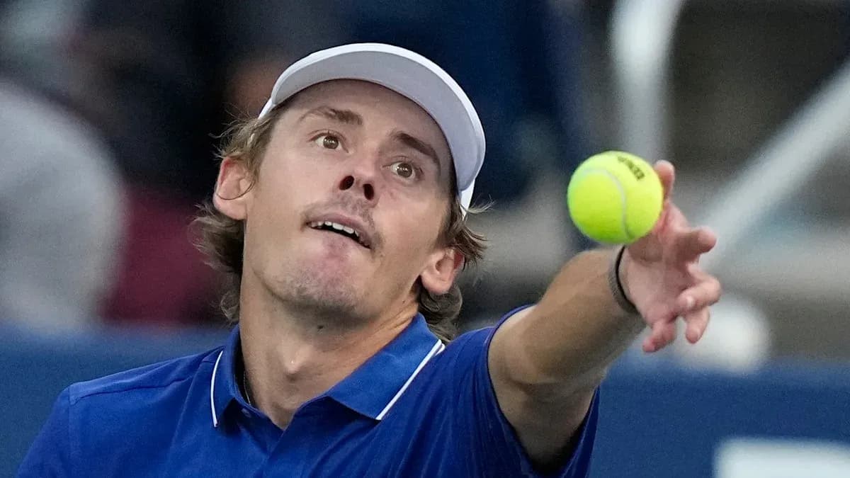 Tennis player serving ball during match Tennis player serving ball during match