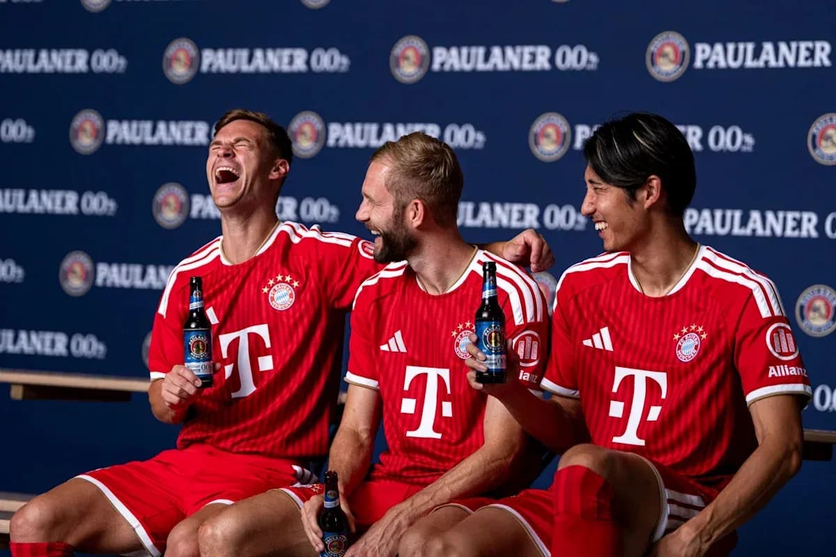 Bayern Munich players posing with drinks during photoshoot Bayern Munich players posing with drinks during photoshoot