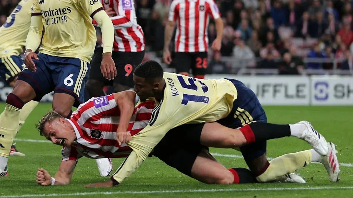 Players battling for the ball on the ground Players battling for the ball on the ground