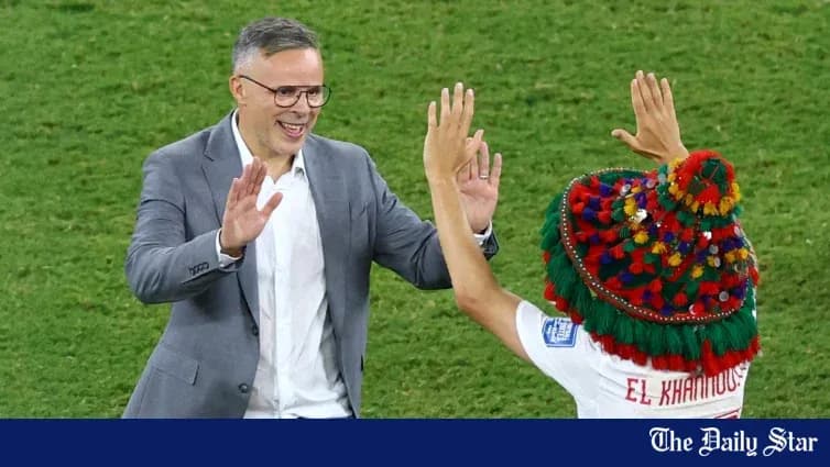 Coach celebrating with player after match Coach celebrating with player after match
