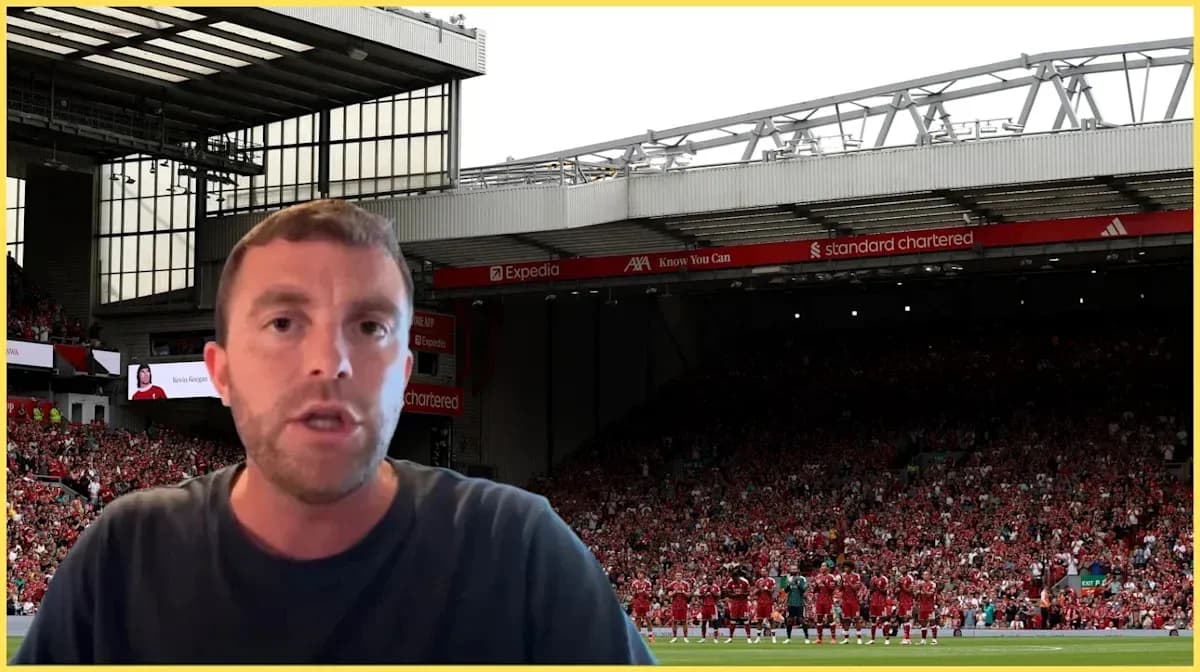 Analyst speaking in front of Anfield stadium crowd Analyst speaking in front of Anfield stadium crowd